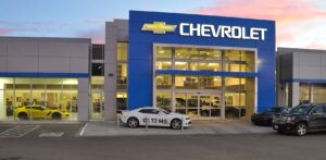 Exterior of Ed Bozarth Chevrolet at dusk in Line Tree. Designed by D2C Architects. Inc