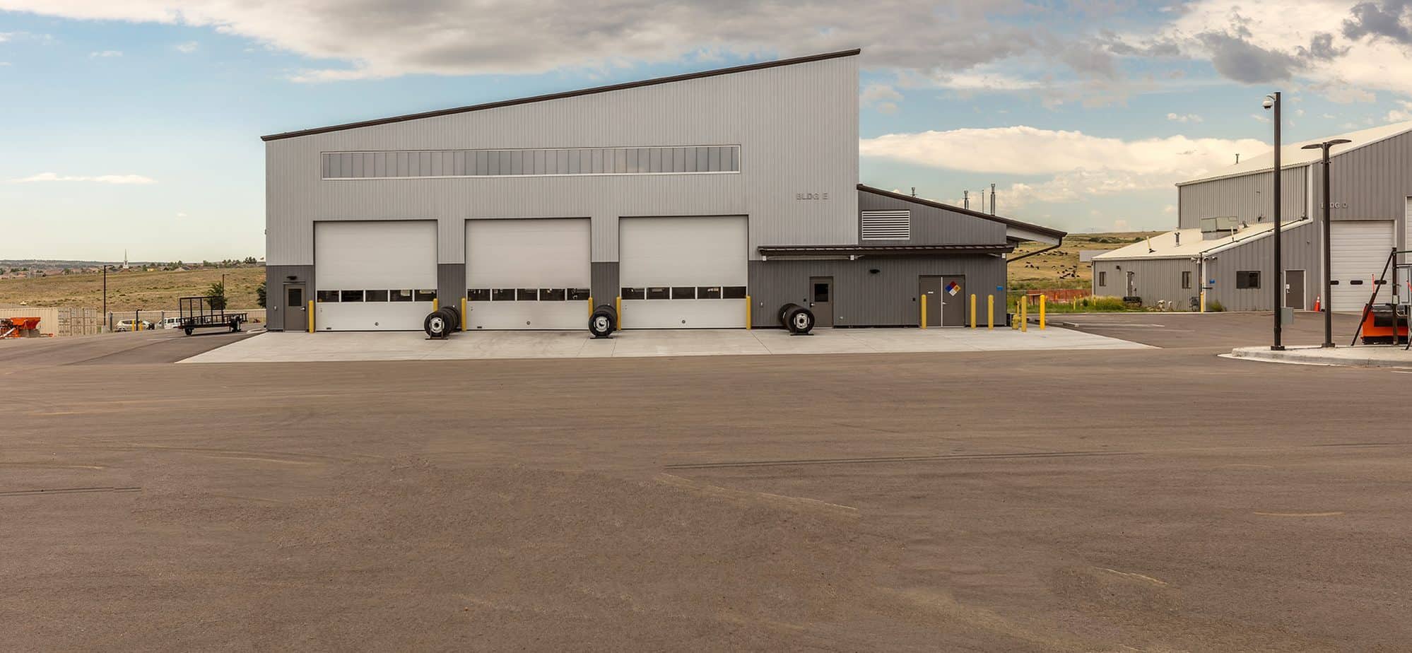Three service bay doors on the exterior of the Douglas County at Parker Road Service Center