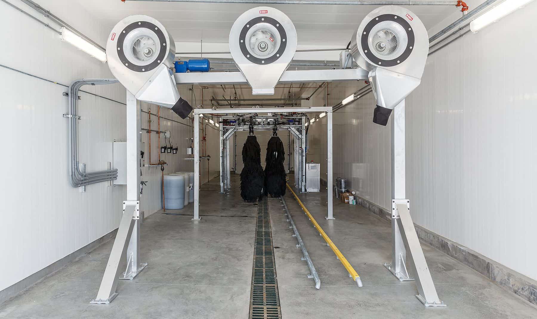 Drying station with 3 large dyers inside the service bay.