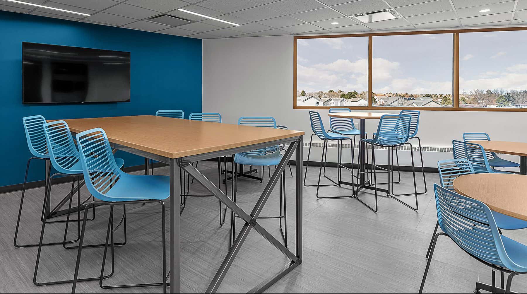 Indoor common space and break room of the Aurora Police Department Headquarters. Remodel competed by D2C Architects and constructed by Mark Young Construction