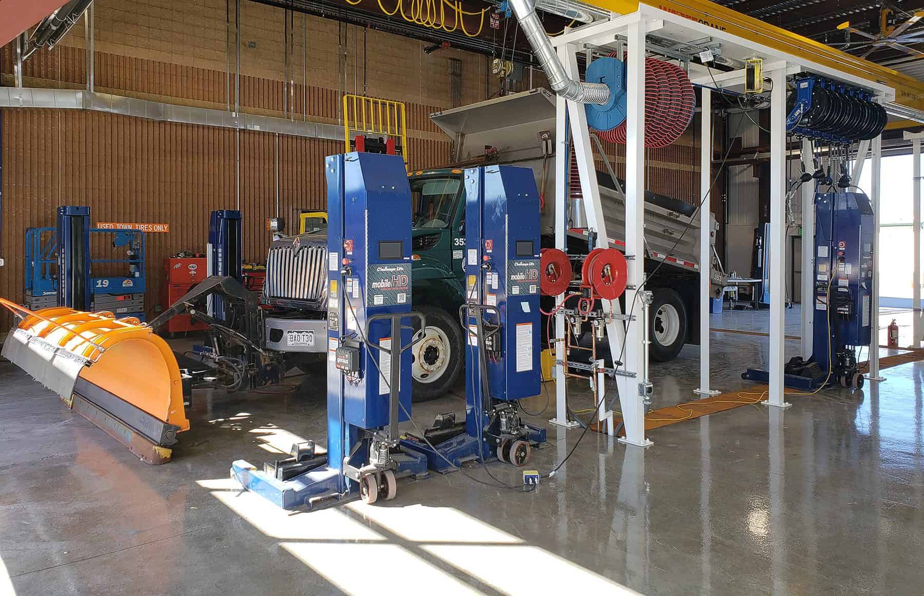 Front side of a truck undergoing maintenance at a service bay in The Town of Castle Rock's Maintenance Center